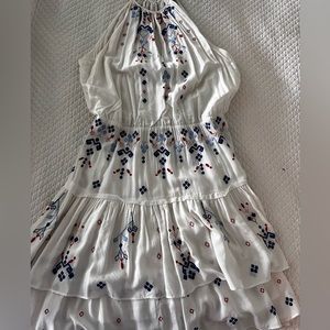 Parker white mini dress with blue and white flowers.